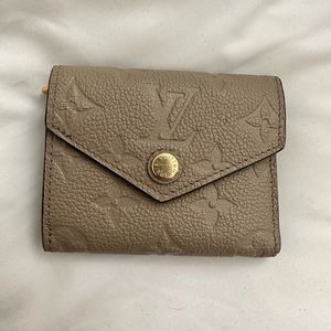 Louis Vuitton Zoe Wallet Empreinte Leather Turtledove